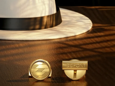 Gold cufflinks with logos